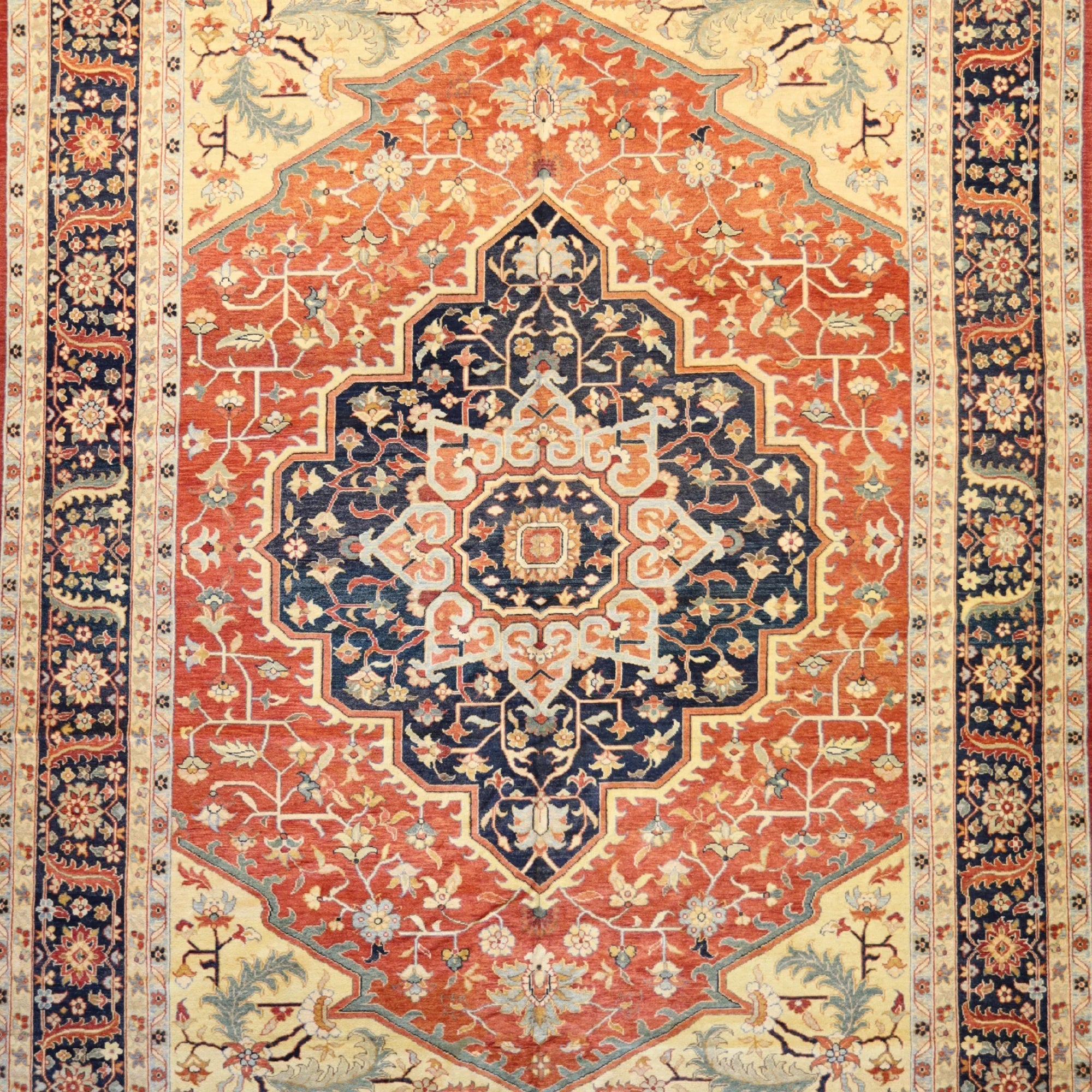 10'2" x 14'3" RUST AND NAVY SERAPI GEOMETRIC PAKISTANI RUG