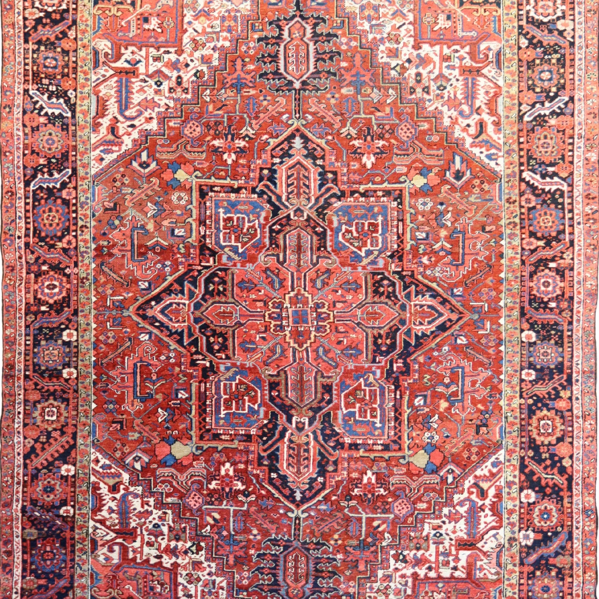 8'8" x 12'3" RUST AND NAVY HERIZ GEOMETRIC PERSIAN RUG