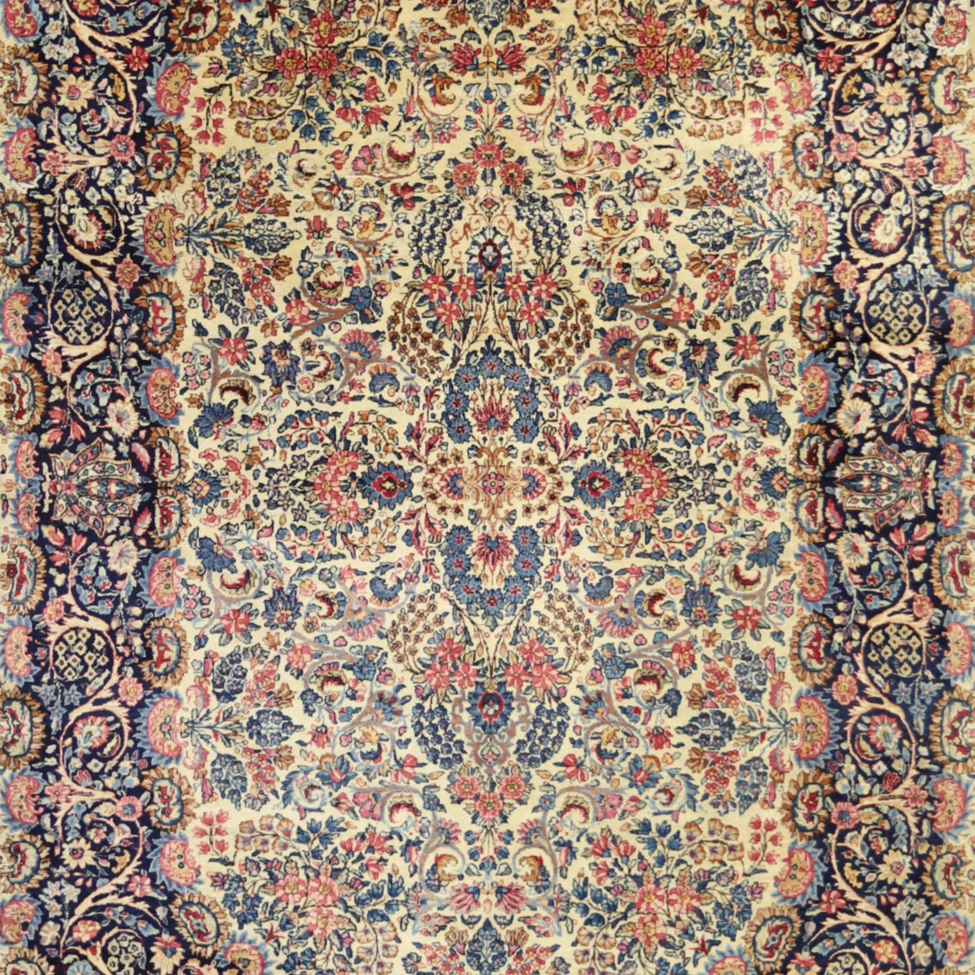 5'10" x 9'0" IVORY AND NAVY KERMAN FLORAL PERSIAN RUG