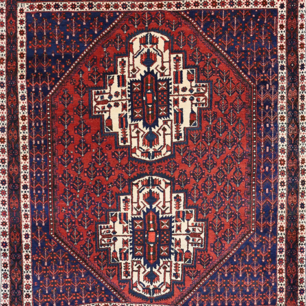 4'10" x 5'8" RUST AND NAVY AFSHAR SEMIANTIQUE PERSIAN RUG