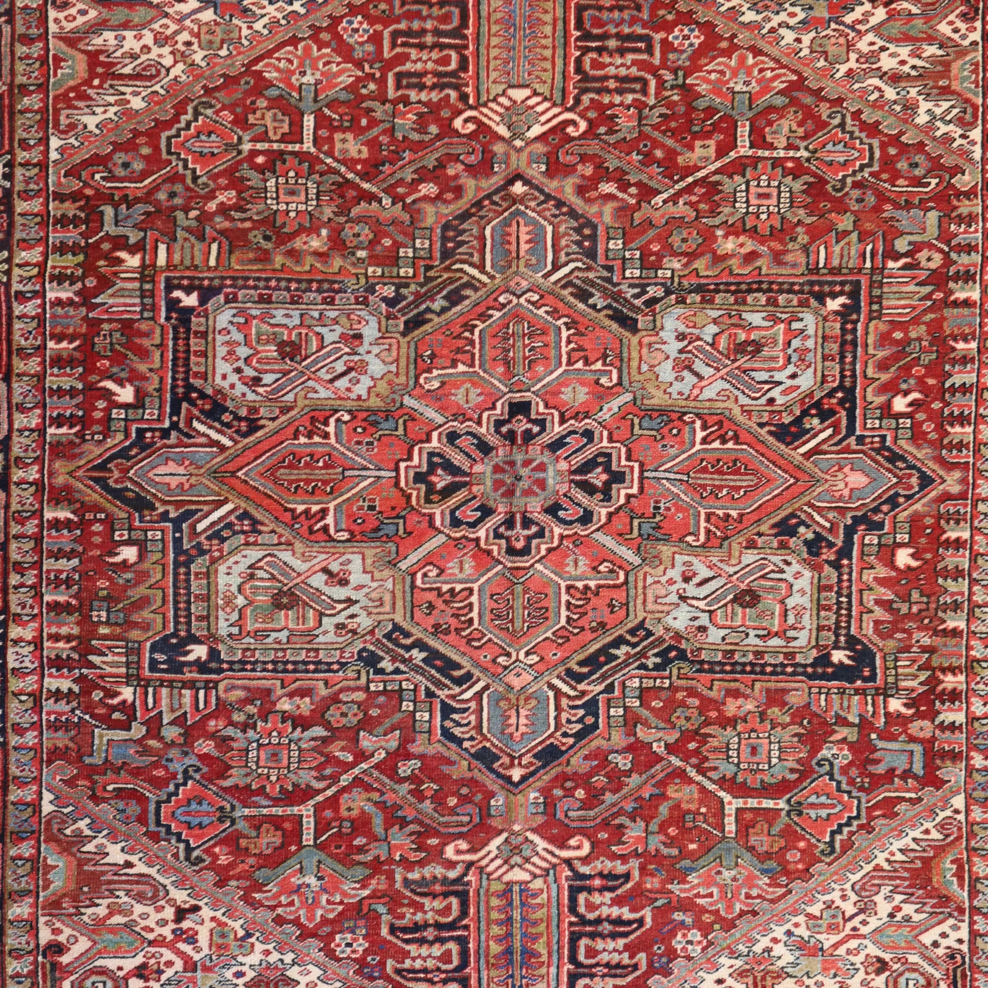 8'9" x 11'0" RED AND NAVY HERIZ ANTIQUE PERSIAN RUG