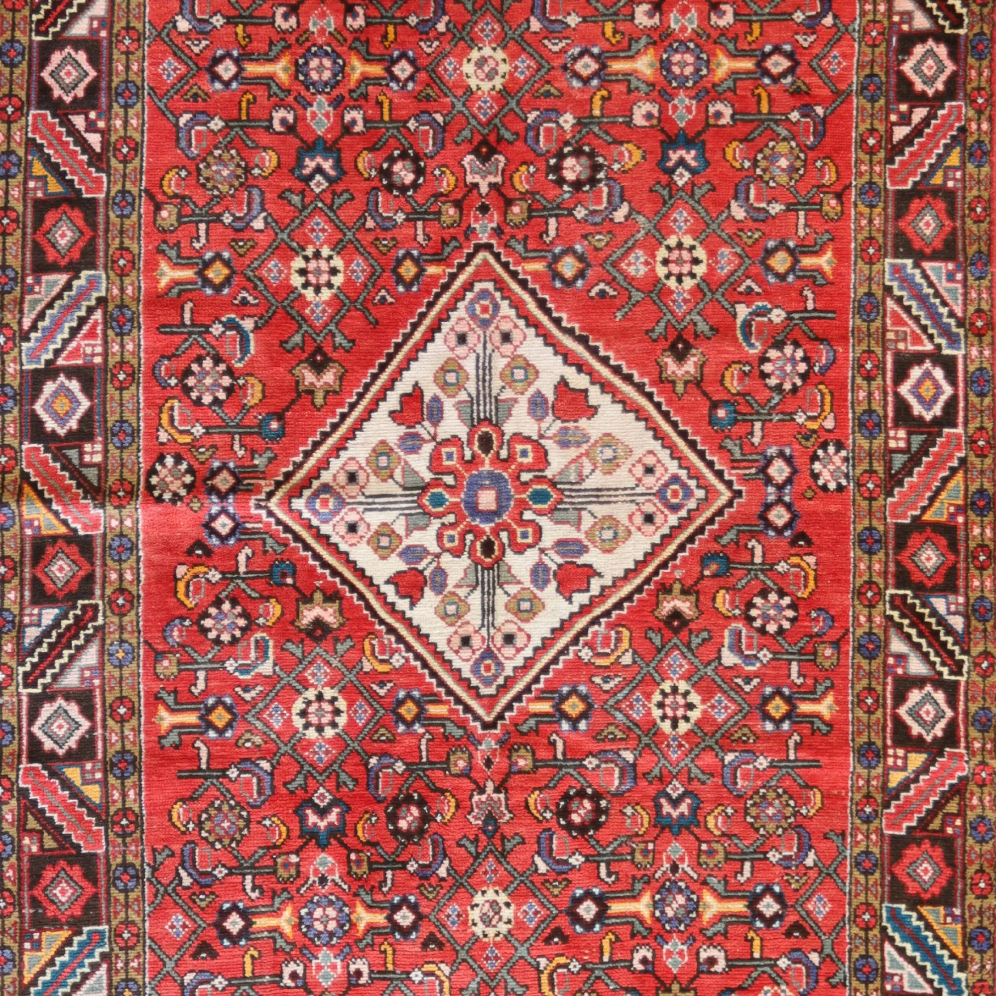 5' 3" x 10' 0" RED AND BLACK HAMEDAN SEMI-ANTIQUE PERSIAN RUG