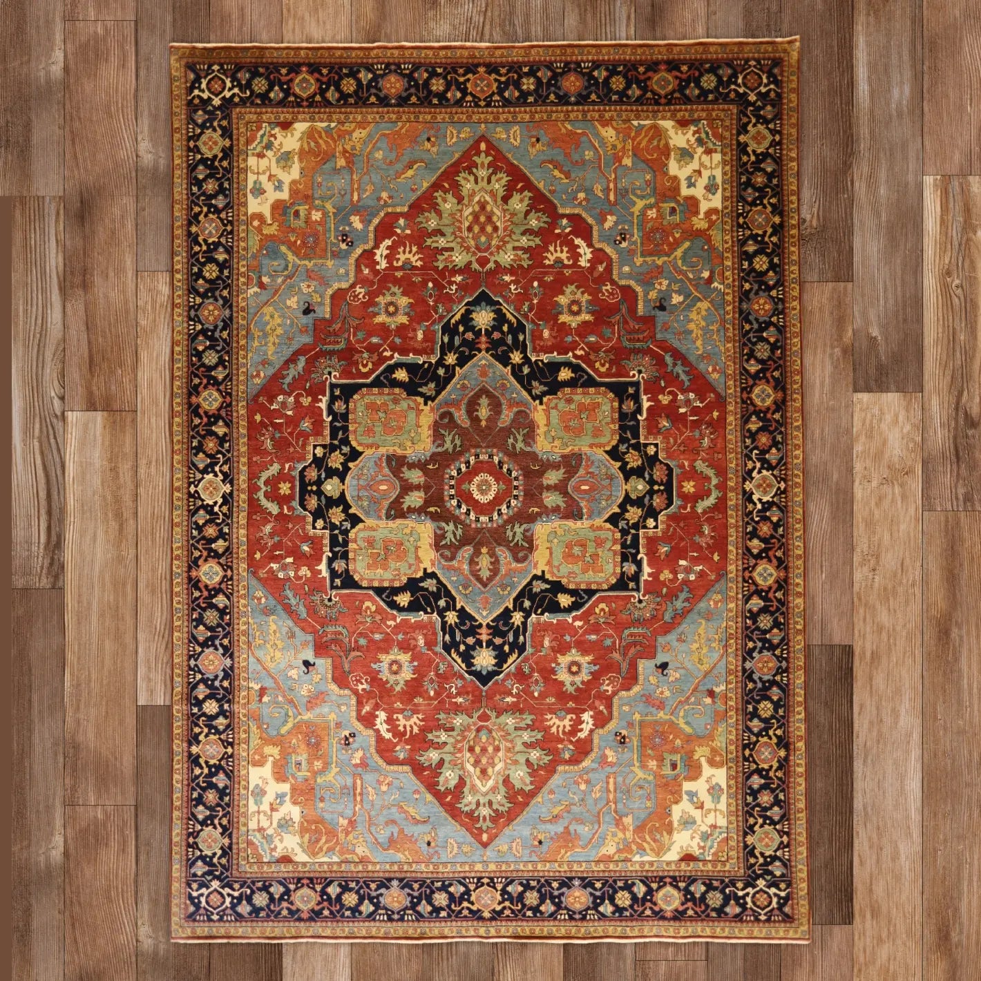 10'0" x 14'2" RED AND NAVY SERAPI GEOMETRIC INDIAN RUG