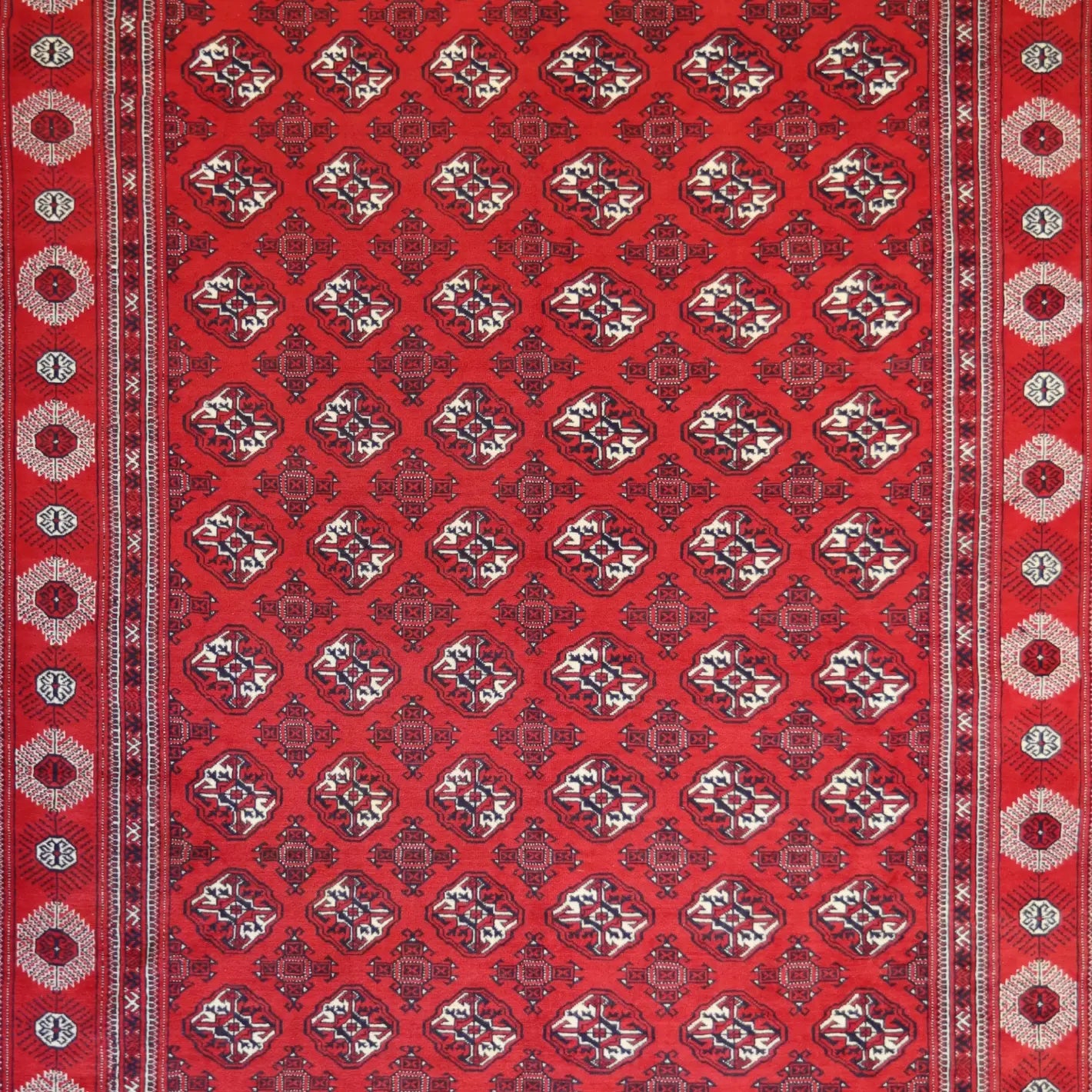 9'6" x  12'10" RED AND RED TURKAMAN GEOMETRIC PERSIAN RUG