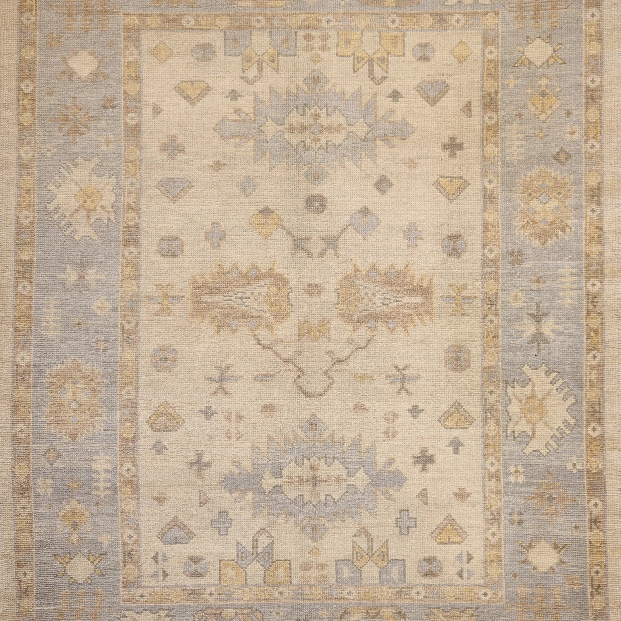 6' 4" x 8' 4" BEIGE AND GRAY OUSHAK GEOMETRIC TURKISH RUG