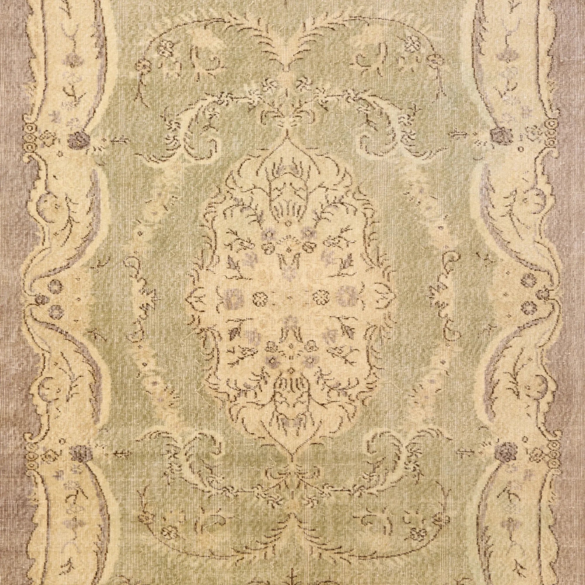 5' 10" x 8' 10" GREEN AND TAN SPARTA FLORAL TURKISH RUG