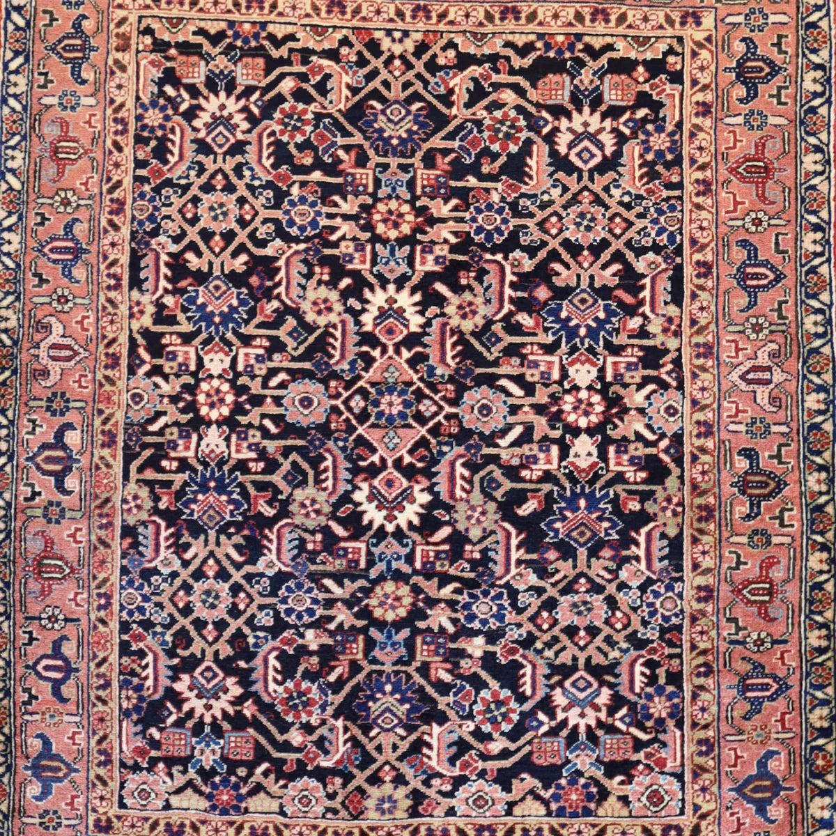 4'9" x 6'0" NAVY AND SALMON HERIZ GEOMETRIC PERSIAN RUG