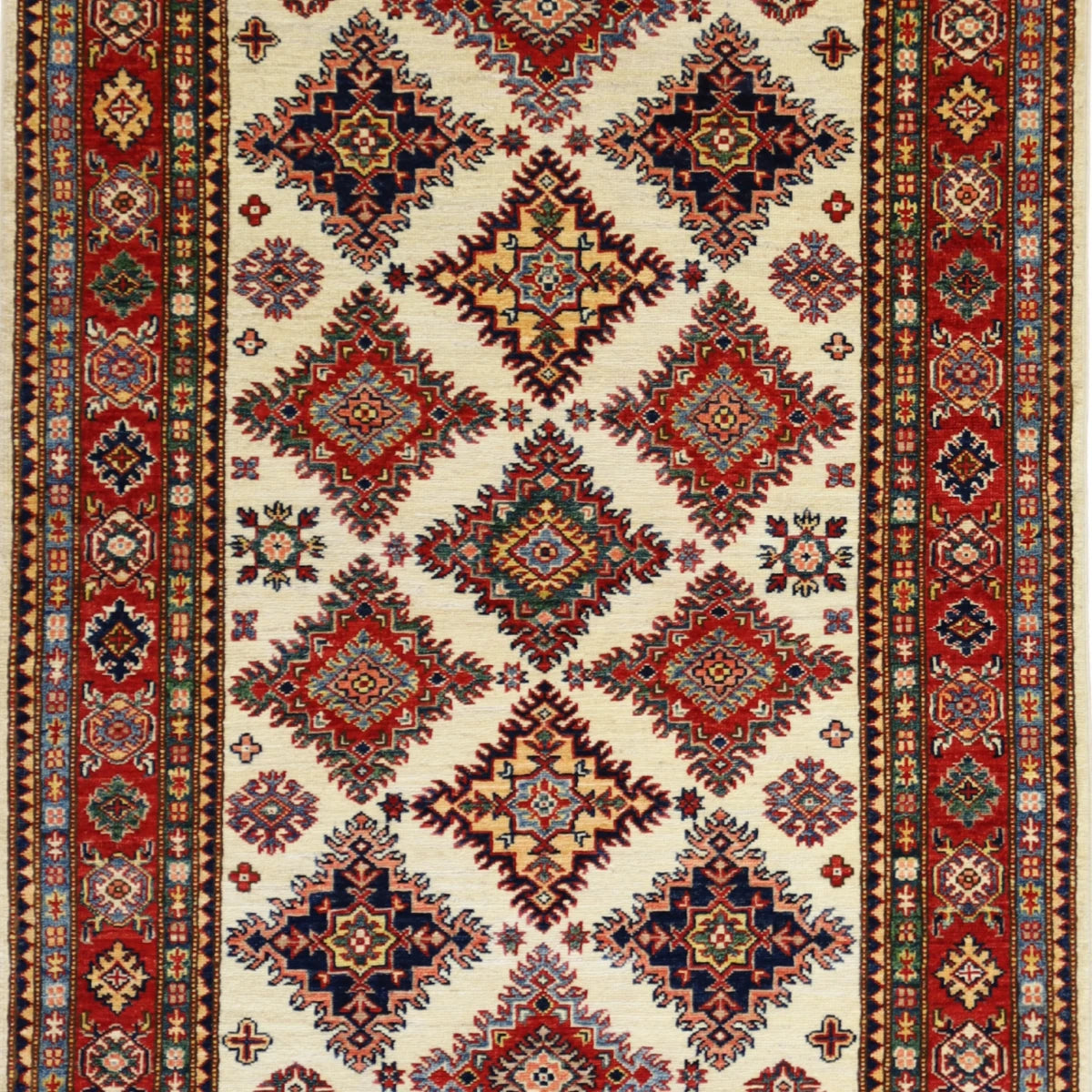 3'10" x 6'3" BEIGE AND RED KAZAK GEOMETRIC PAKISTANI RUG