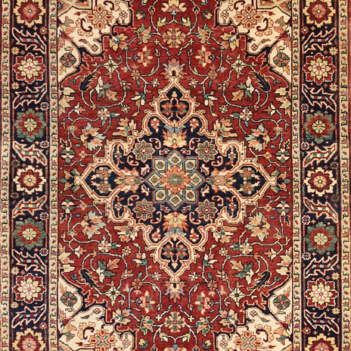 3'11" x 6'0" RED AND NAVY SERAPI GEOMETRIC INDIAN RUG