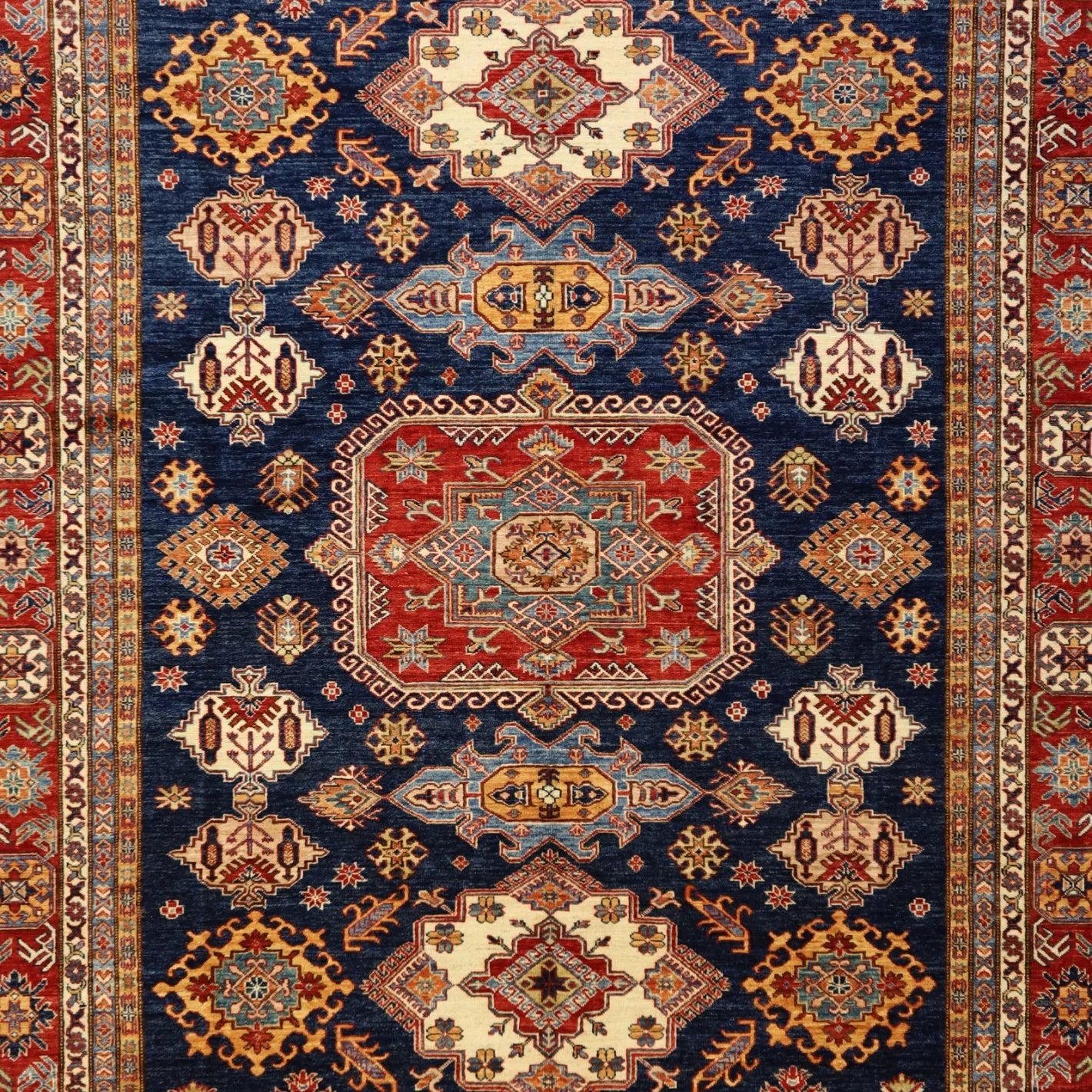 8'1" x 9'11" NAVY AND RED KAZAK PAKISTANI GEOMETRIC RUG