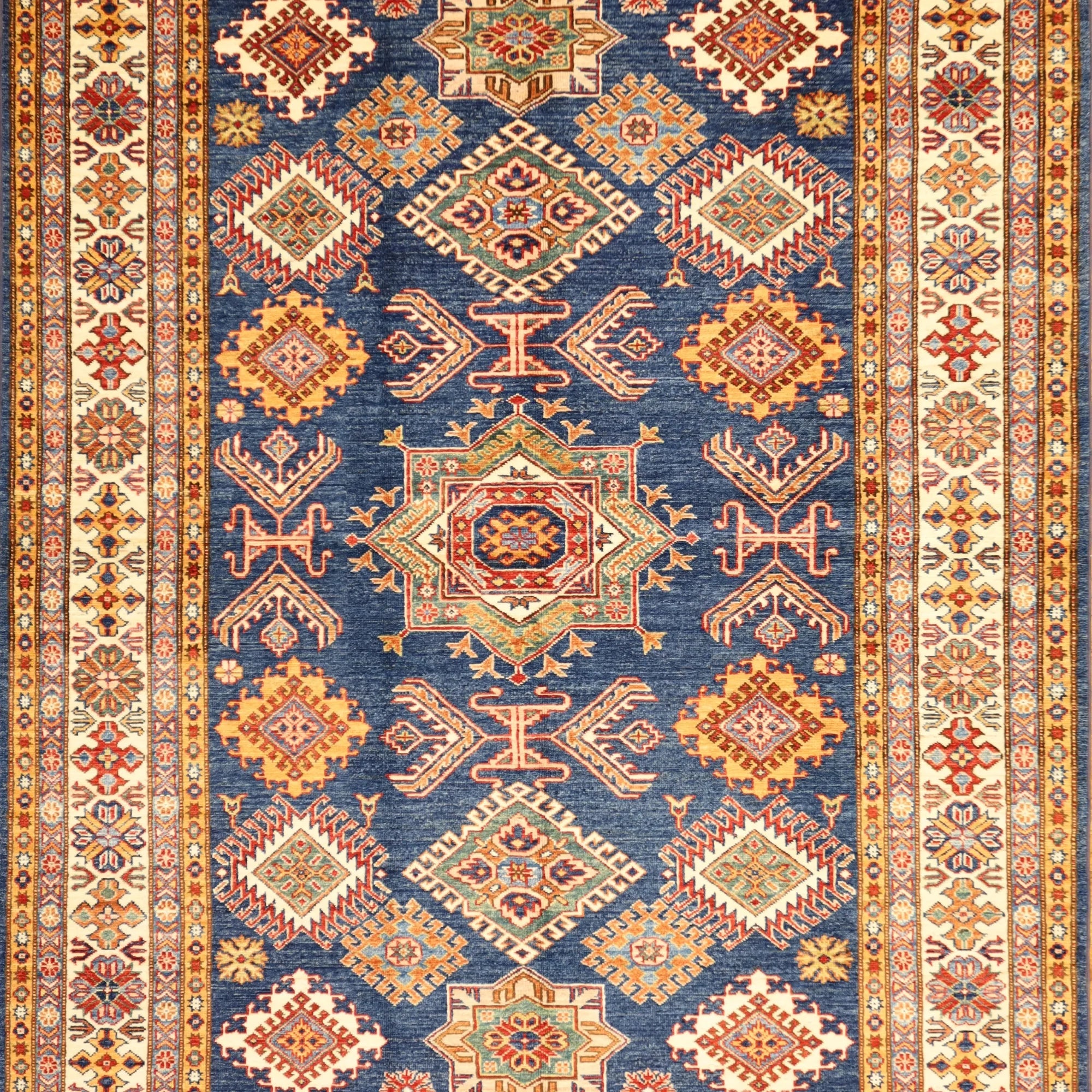 5' 8" x 8' 0" NAVY AND IVORY KAZAK GEOMETRIC PAKISTANI RUG