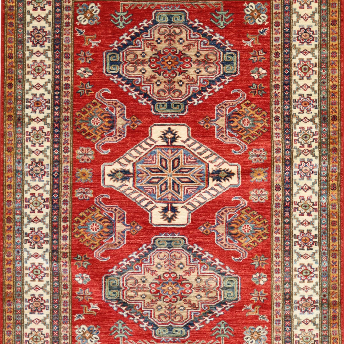 4'2" x 5'8" RED AND IVORY KAZAK GEOMETRIC PAKISTANI RUG