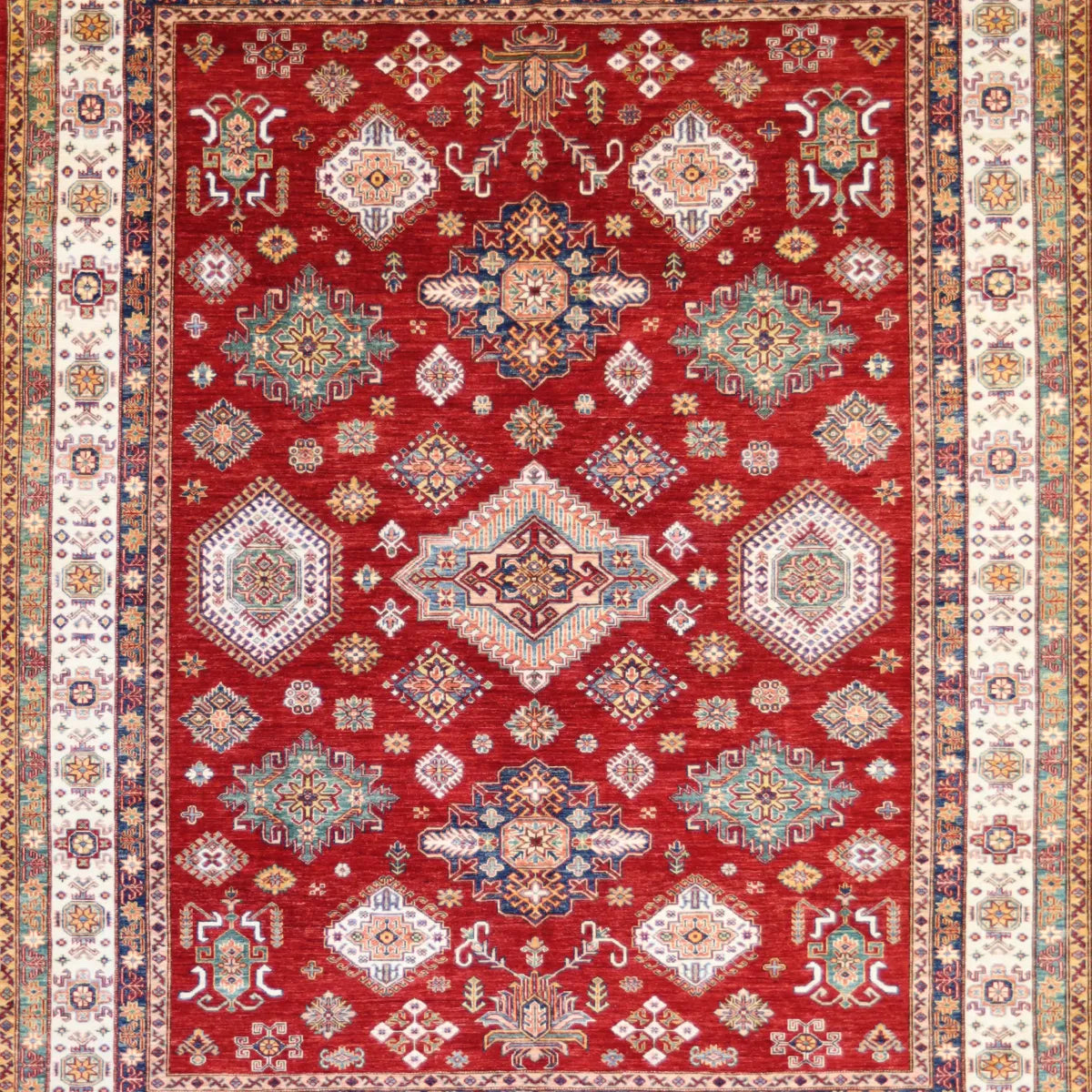 8' 1" x 9' 11" - RED AND IVORY KAZAK GEOMETRIC PAKISTANI RUG
